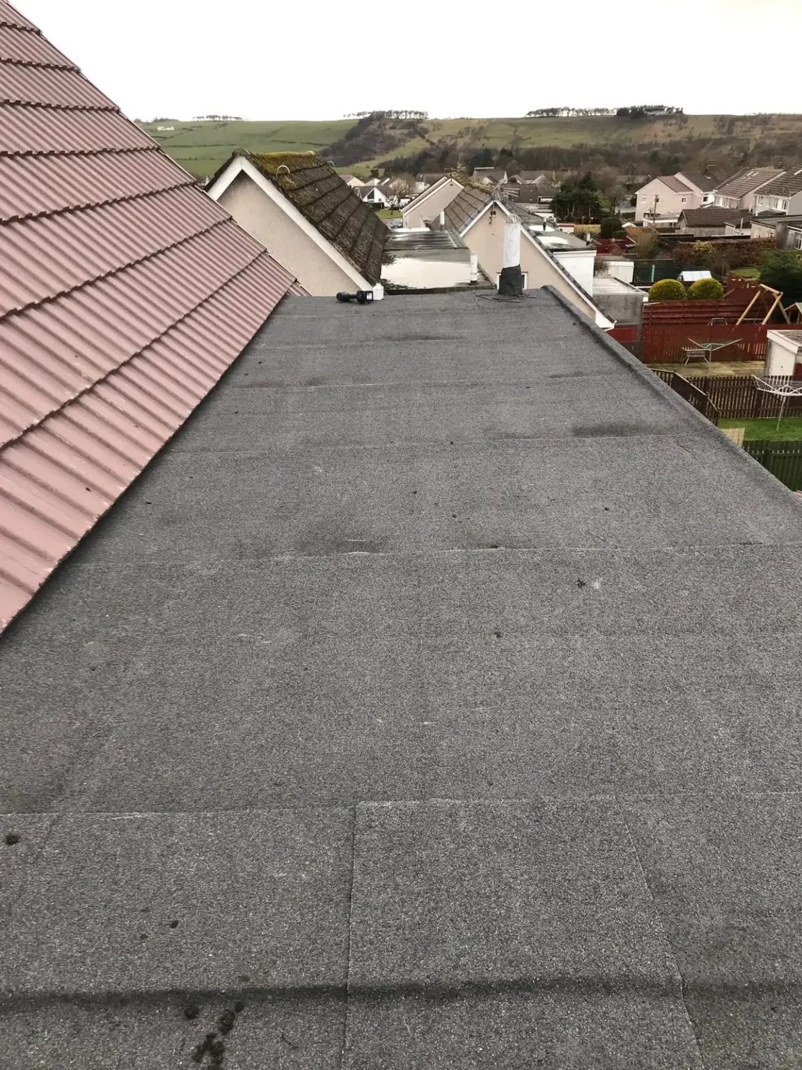 Flat roof installation completed by an experienced roofing company in Glasgow on a residential property